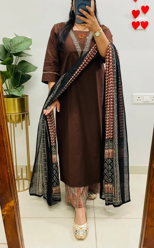 Dhabu_cotton_suit_set_with_heavy_embroidery_work_on_the_yoke_and_pockets__with_border_detailing_on_Sleeves.