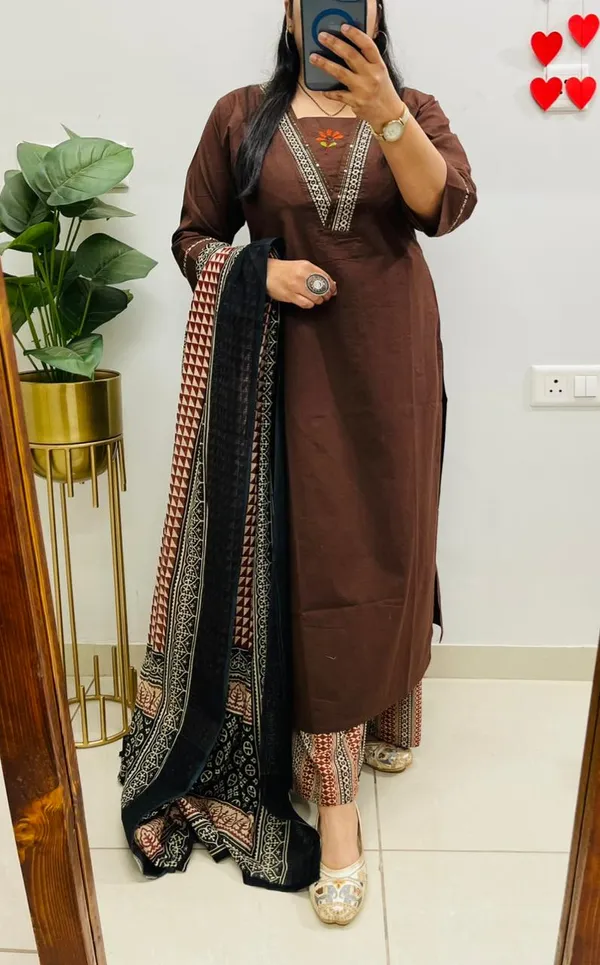 Dhabu_cotton_suit_set_with_heavy_embroidery_work_on_the_yoke_and_pockets__with_border_detailing_on_Sleeves.