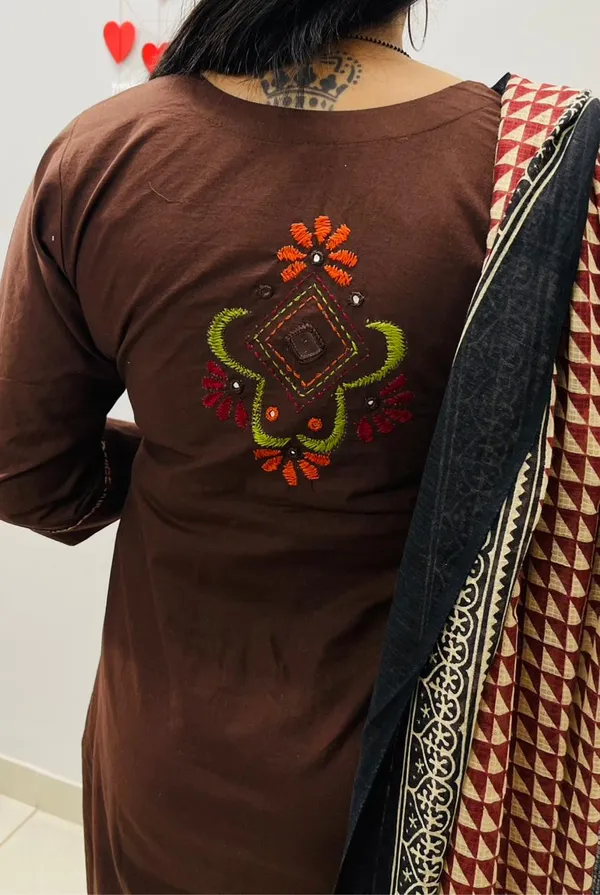 Dhabu_cotton_suit_set_with_heavy_embroidery_work_on_the_yoke_and_pockets__with_border_detailing_on_Sleeves.