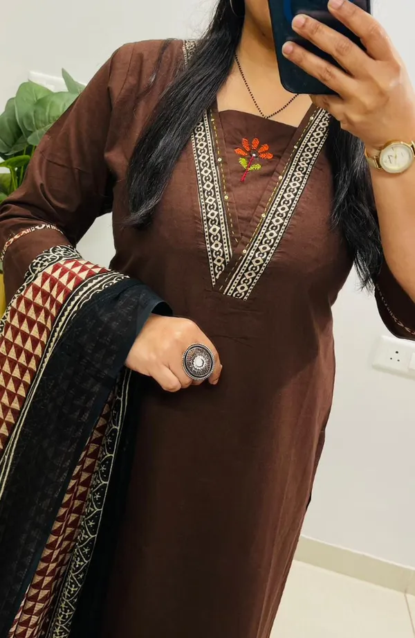 Dhabu_cotton_suit_set_with_heavy_embroidery_work_on_the_yoke_and_pockets__with_border_detailing_on_Sleeves.