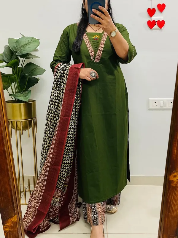 Dhabu_cotton_suit_set_with_heavy_embroidery_work_on_the_yoke_and_pockets__with_border_detailing_on_Sleeves.
