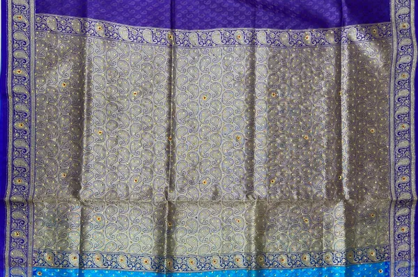 Humairah_Presents_Turqouise_Blue_Tanchoi_Silk_Low_Stone_Work_with_Contrast_Purple_Pallu_Zari_Border_Saree_and_Blue_Blouse