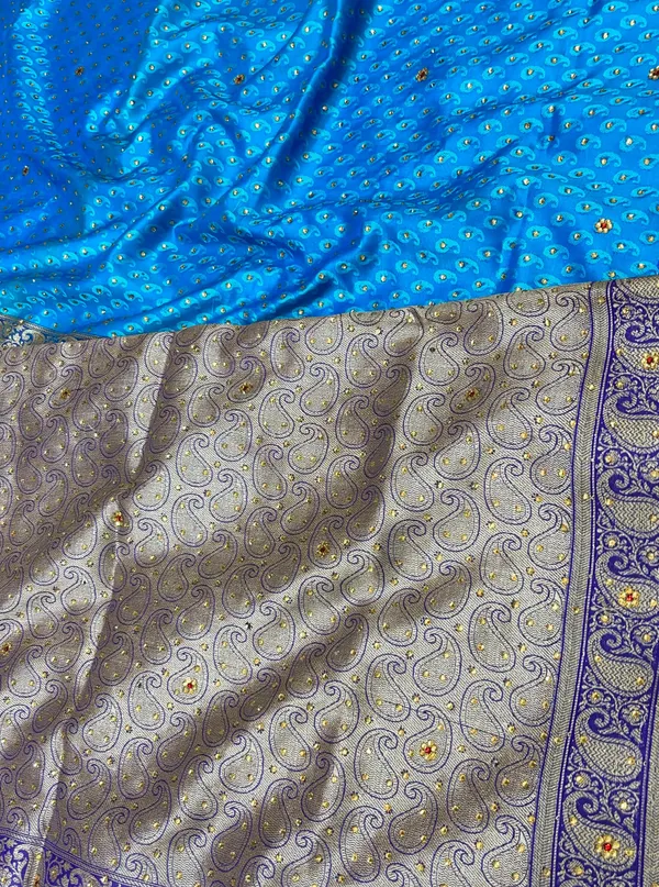 Humairah_Presents_Turqouise_Blue_Tanchoi_Silk_Low_Stone_Work_with_Contrast_Purple_Pallu_Zari_Border_Saree_and_Blue_Blouse