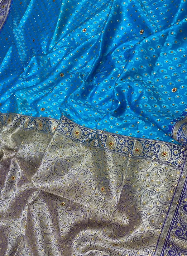 Humairah_Presents_Turqouise_Blue_Tanchoi_Silk_Low_Stone_Work_with_Contrast_Purple_Pallu_Zari_Border_Saree_and_Blue_Blouse