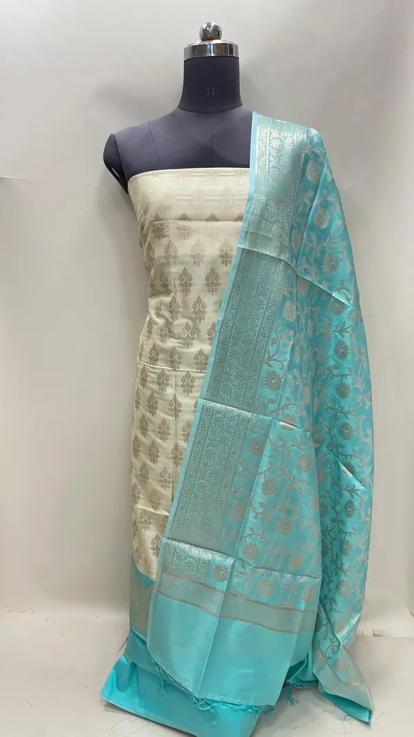 Humairah_Presents_Off_white_Semi_Katan_Silk_Floral_Zari_Booti_3_pcs_Suit_Set_with_Contrast_Blue_Plain_Bottom_and_Tilfi_Jaal_Blue_Dupatta_ASD_121