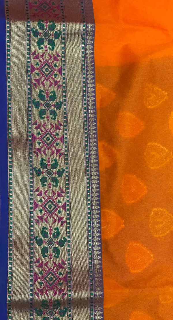 Humairah_Presents_Orange_Solid_Silk_Blend_Saree_With_Blouse_Piece_GEJA20