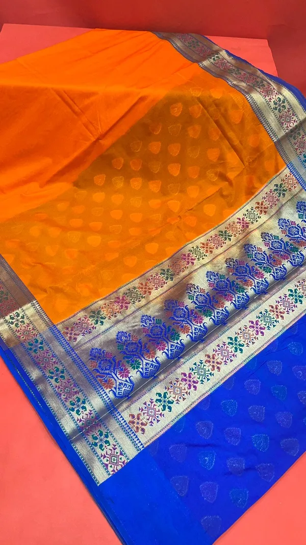 Humairah_Presents_Orange_Solid_Silk_Blend_Saree_With_Blouse_Piece_GEJA20