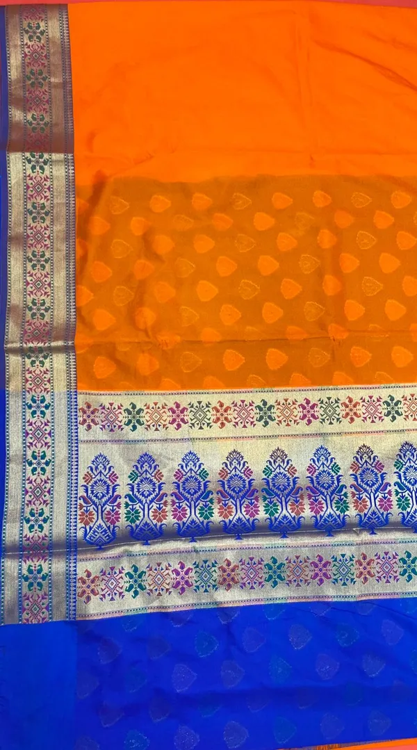 Humairah_Presents_Orange_Solid_Silk_Blend_Saree_With_Blouse_Piece_GEJA20