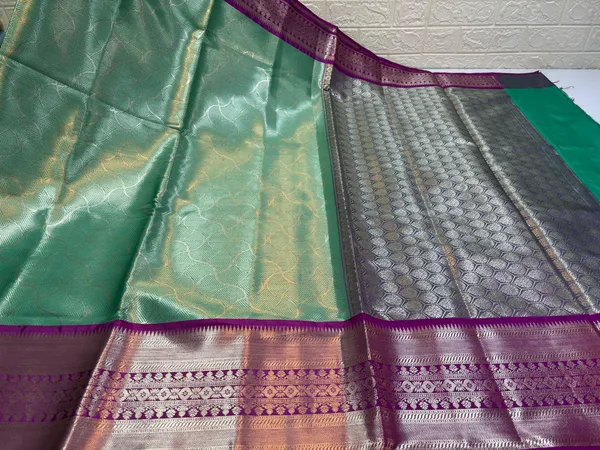 Seagreen_Semi_Kanchi_Silk_Silver_Floral_Jaal_Contrast_Pink_Border_Banarasi_Saree_MS_SK33