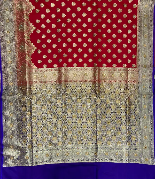 Humairah_Presents_Red_Satin_Silk_Floral_Zari_Booti_Heavy_Stone_Work_Skirt_Pan_Boota_Zari_Border_with_Contrast_Blue_Pallu_and_Blue_Blouse