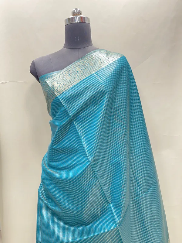 Humairah_Presents_Sky_Blue_Organza_Zari_Plain_Striped_with_Gold_Zari_Border_with_Contrast_Gold_Pallu_and_Sky_Blue_Blouse