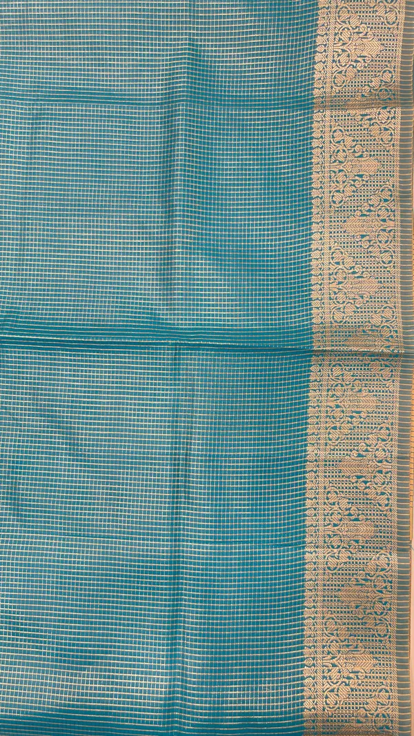 Humairah_Presents_Sky_Blue_Organza_Zari_Plain_Striped_with_Gold_Zari_Border_with_Contrast_Gold_Pallu_and_Sky_Blue_Blouse