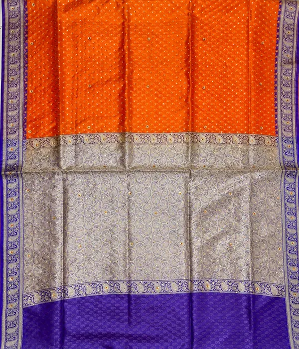 Humairah_Presents_Orange_Tanchoi_Silk_Low_Stone_Work_with_Contrast_Blue_Pallu_Zari_Border_and_Purple_Blouse