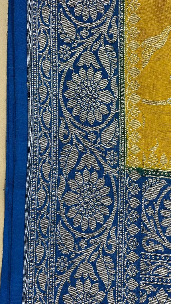 Humairah_Presents_Yellow_Tussar_Silk_Handpainted_Floral_Zari_Jaal_with_Contrast_Blue_Banarasi_Floral_Jaal_Pallu_Zari_Border_and_Blue_Blouse