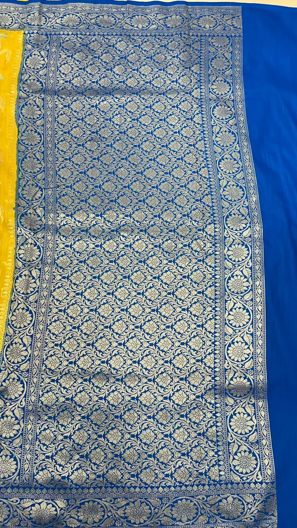 Humairah_Presents_Yellow_Tussar_Silk_Handpainted_Floral_Zari_Jaal_with_Contrast_Blue_Banarasi_Floral_Jaal_Pallu_Zari_Border_and_Blue_Blouse
