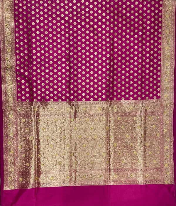 Humairah_Presents_Magenta_Satin_Silk_Floral_Zari_Booti_Heavy_Stone_Work_Banarasi_Saree_with_Lehariya_Pallu_and_Magenta_Blouse