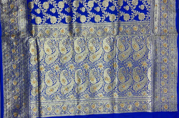 Humairah_Presents_Blue_Satin_Silk_Floral_Zari_Jaal_Low_Stone_Work_Banarasi_Saree_with_Paisley_Zari_Jaal_Pallu_and_Blue_Blouse
