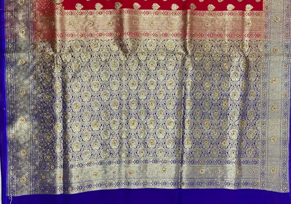 Humairah_Presents_Red_Satin_Silk_Floral_Zari_Booti_Low_Stone_Work_Skirt_Pan_Boota_Zari_Border_with_Contrast_Blue_Pallu_and_Blue_Blouse