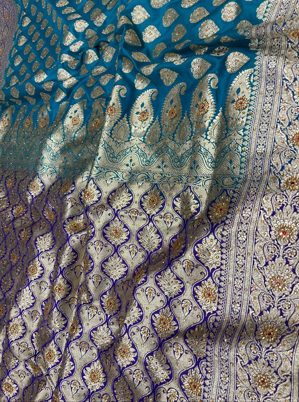 Humairah_Presents_Seagreen_Satin_Silk_Floral_Zari_Boota_Low_Stone_Work_Banarasi_Saree_with_Contrast_Purple_Pallu_and_Purple_Blouse