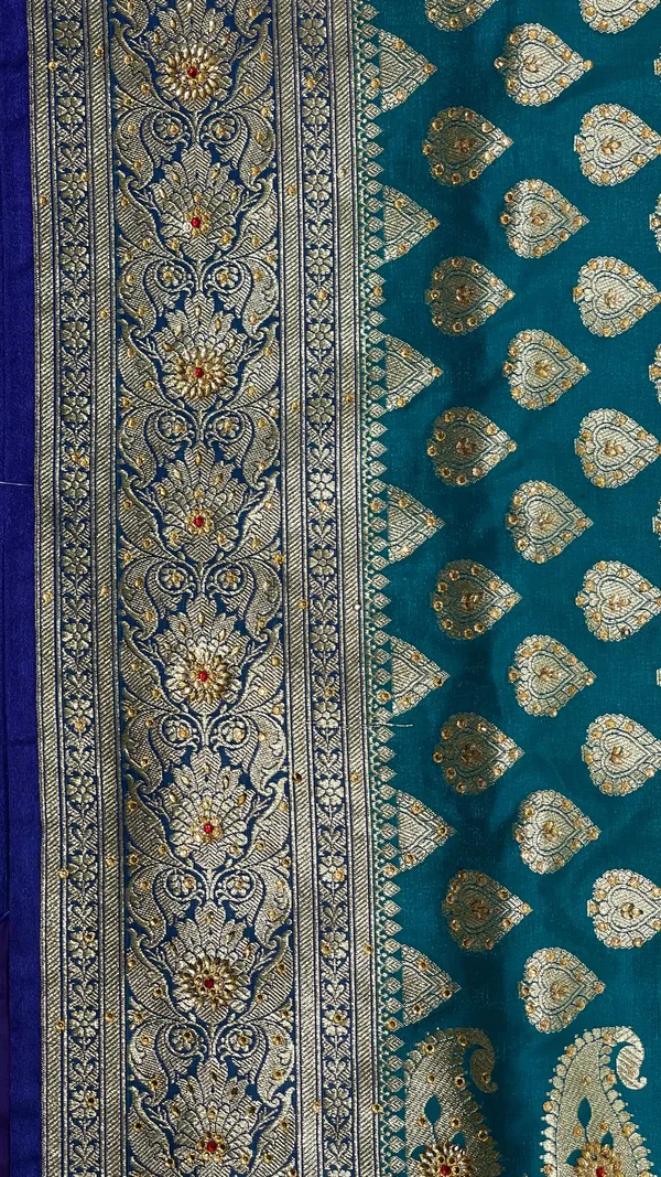 Humairah_Presents_Seagreen_Satin_Silk_Floral_Zari_Boota_Low_Stone_Work_Banarasi_Saree_with_Contrast_Purple_Pallu_and_Purple_Blouse