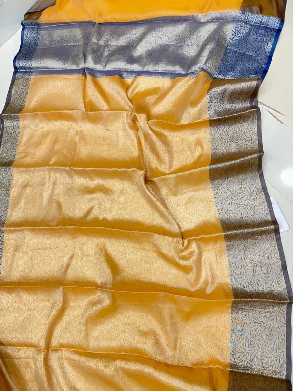 Humairah_Presents_Mustard_Art_Silk_Floral_Lehariya_Sliver_Jaal_with_Contrast_Blue_Pallu_and_Olive_Copper_Silver_Jaal_Zari_Border_with_Blue_Blouse