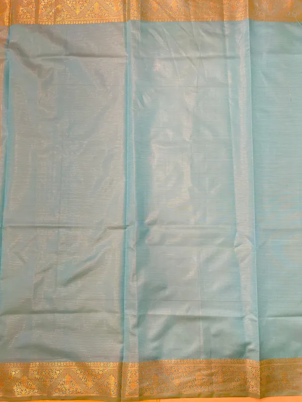 Humairah_Presents_Light_Blue_Organza_Zari_Plain_Striped_with_Gold_Zari_Border_with_Contrast_Gold_Pallu_and_Light_Blue_Blouse
