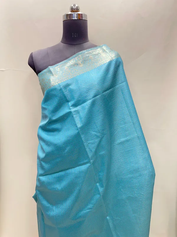 Humairah_Presents_Light_Blue_Organza_Zari_Plain_Striped_with_Gold_Zari_Border_with_Contrast_Gold_Pallu_and_Light_Blue_Blouse