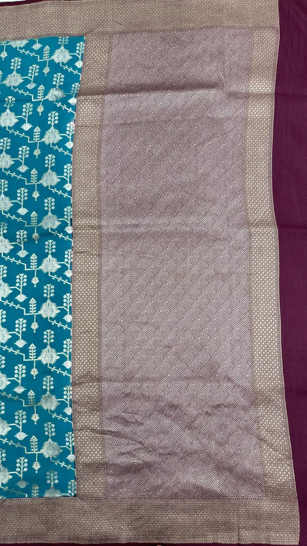 Humairah_Presents_Sea_Green_Tussar_Silk_Floral_Silver_Minakari_Stripe_Jaal_with_Contrast_Brown_Banarasi_Pallu_Zari_Border_and_Brown_Blouse