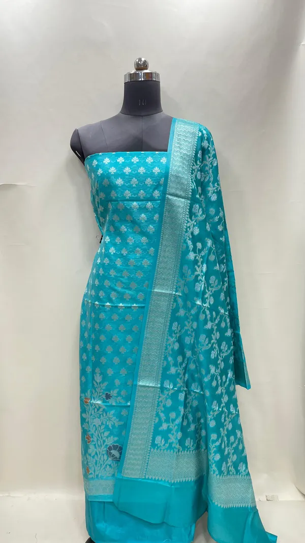 Humairah_Turqouise_Blue_Semi_Georgette_Floral_Ikkat_Mina_Border_3_pcs_Suit_Set_with_Plain_Bottom_and_Floral_Zari_Jaal_Turqouise_Blue_Dupatta