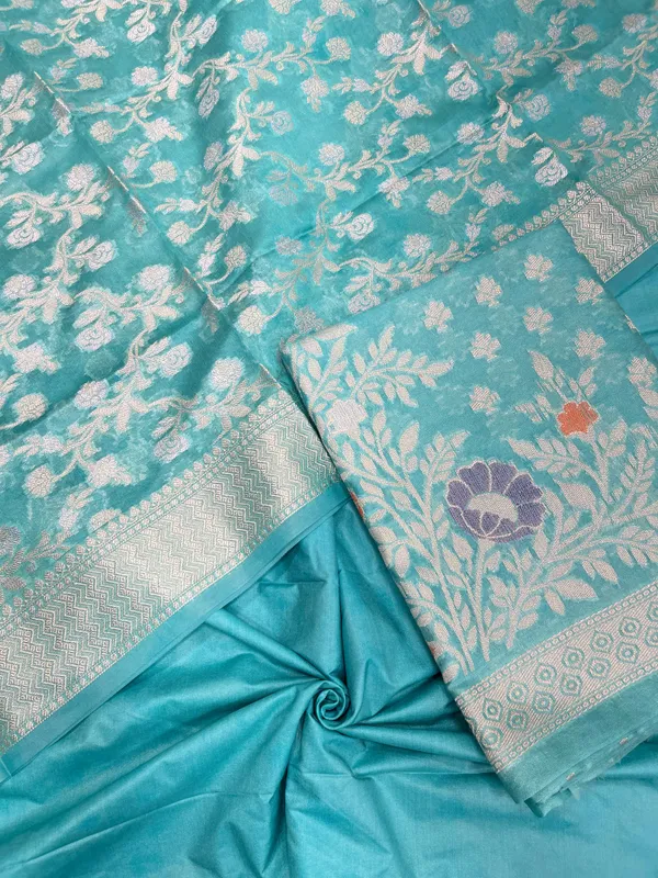 Humairah_Turqouise_Blue_Semi_Georgette_Floral_Ikkat_Mina_Border_3_pcs_Suit_Set_with_Plain_Bottom_and_Floral_Zari_Jaal_Turqouise_Blue_Dupatta