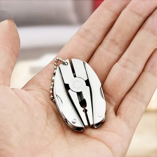 Mini_Portable_Pocket_Plier_Keychain_Hand_Tool_Kit,_Portability_and_Functionality_with_Our_Stainless_Steel_Multifunctional_Folding_Plier_Screwdriver_Pocket_Tool_Set_(Silver/Pack_Of_1).