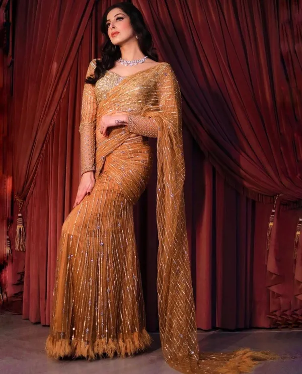 NEW_BOLLYWOOD_STYLE_FANCY_LEHENGHA_CUM_SAREE_SEQUENCE_EMBROIDERED_WORK_WITH_CHOLI