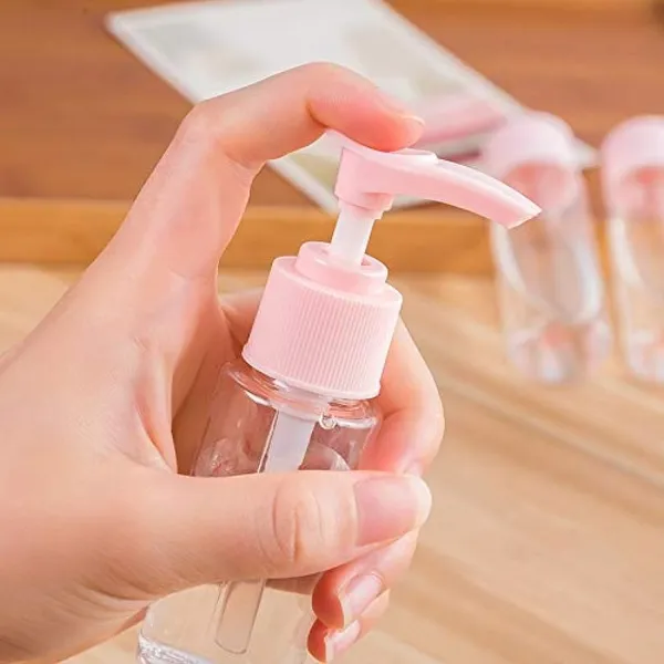 Portable_Travel_Cosmetics_Bottles_Plastic_Pressing_Spray_Bottle_for_Makeup,_Container_Bottle_Set,_Shampoo_Bottle,_Toiletries_Liquid,_Containers_Spray_Bottles_with_3_pcs_Jars_(Colour-_Pink).