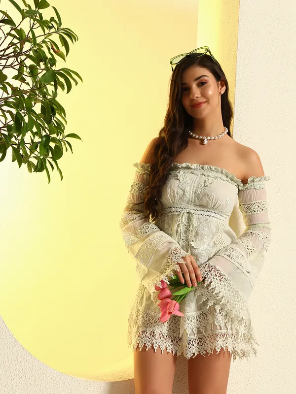 ZASTRAA_GREEN_EMBROIDERED_SCHIFFLI_LACE_DRESS_WITH_ADDED_HAND_EMBROIDERY