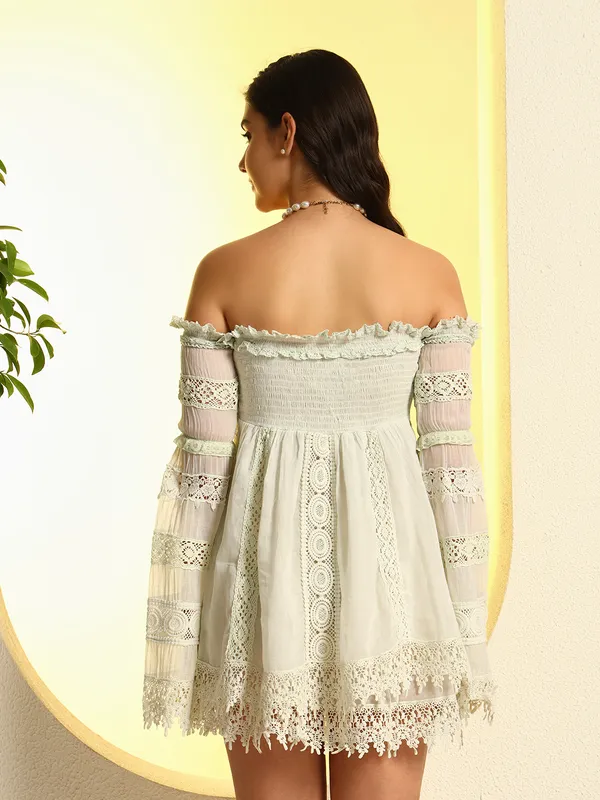 ZASTRAA_GREEN_EMBROIDERED_SCHIFFLI_LACE_DRESS_WITH_ADDED_HAND_EMBROIDERY