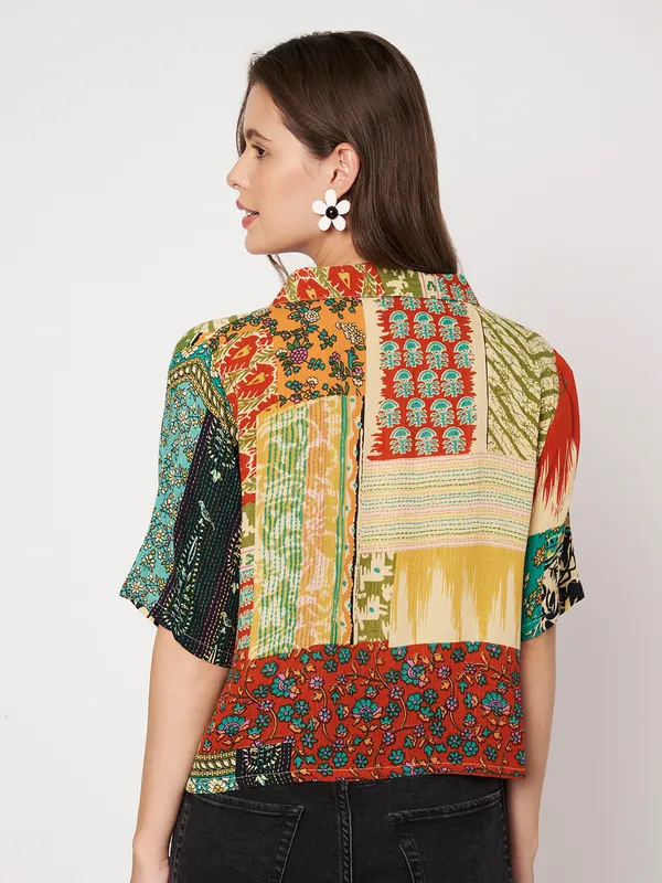 half_sleeves_,collor_front_open__buttons_,_ethnic_motif_printed__top