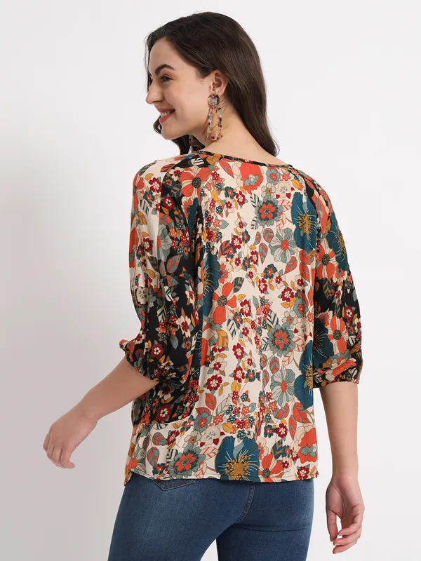 round_neck_half_sleeves,embroidery_at_neck,doori_printed_blouse