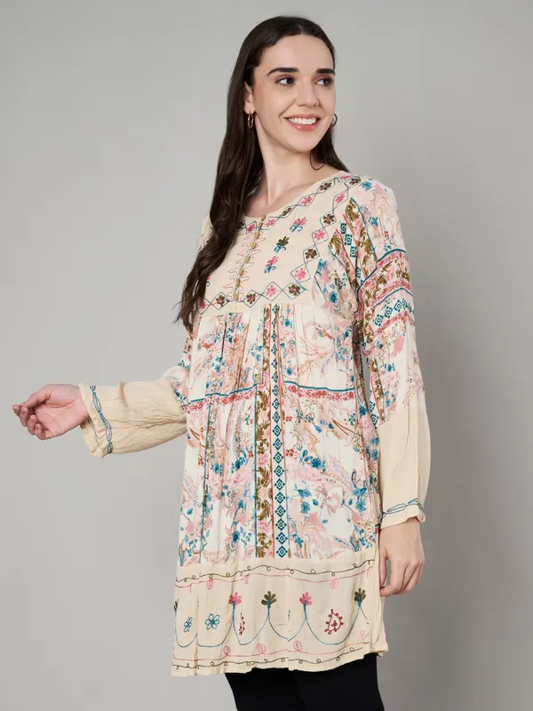 round_neck_,printed_full_sleeves,_buttons_at_yoke_Embroidery_at_yoke_and_bottom/sleeves
