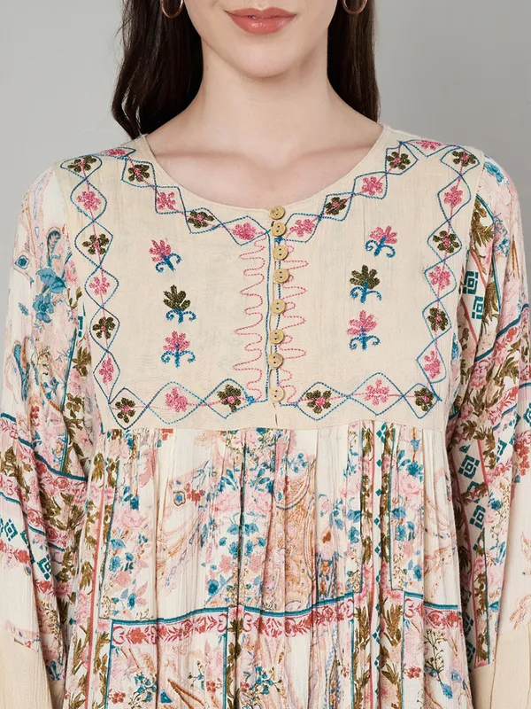 round_neck_,printed_full_sleeves,_buttons_at_yoke_Embroidery_at_yoke_and_bottom/sleeves