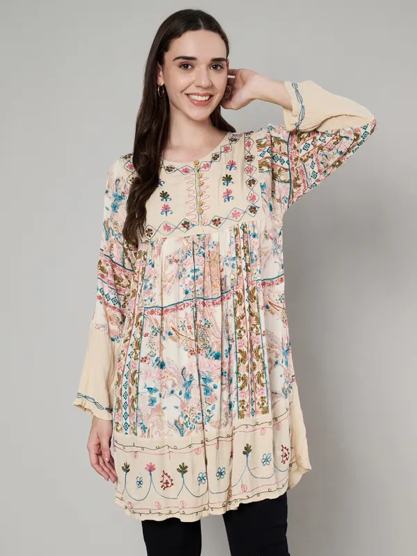 round_neck_,printed_full_sleeves,_buttons_at_yoke_Embroidery_at_yoke_and_bottom/sleeves