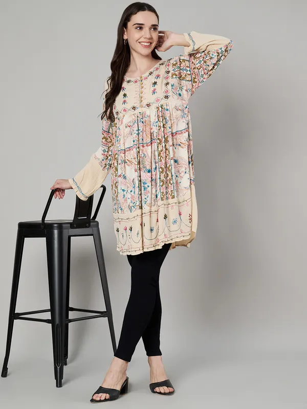 round_neck_,printed_full_sleeves,_buttons_at_yoke_Embroidery_at_yoke_and_bottom/sleeves