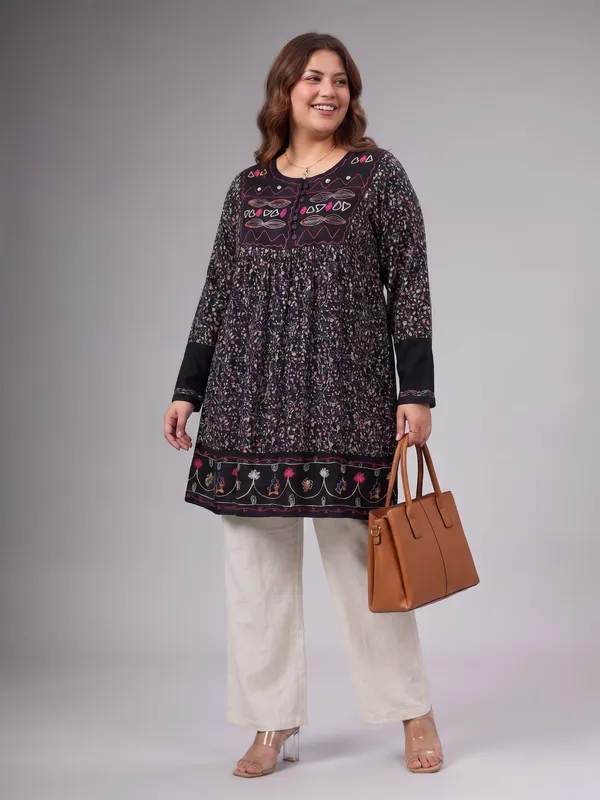 round_neck_,printed_full_sleeves,_Embroidery_at_neck_and_bottom,buttons_at_neck_tunic_kurti