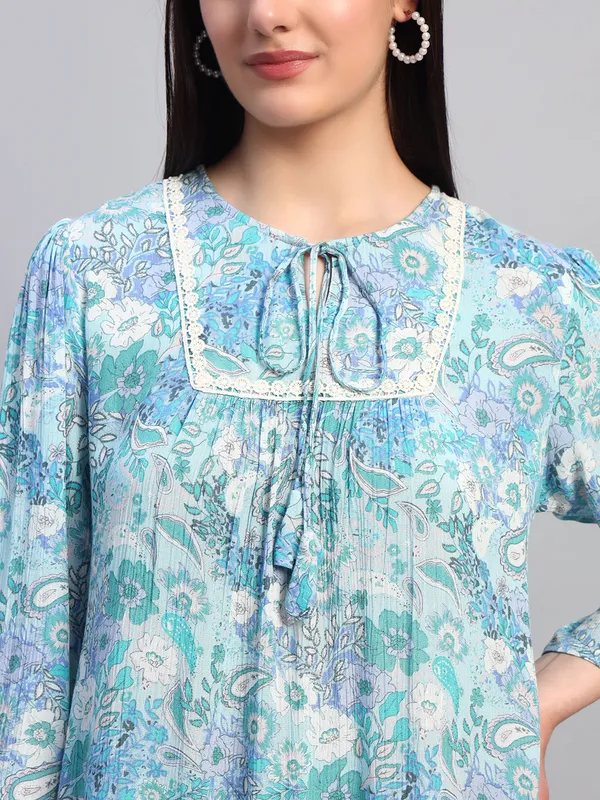 round_neck_lace_at_yoke,_doori_at_neck,3/4_sleeves_bottom_tier_printed_tunic