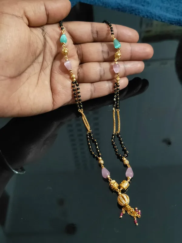 Modern_Style_Mangalsutra_with_Elegant_Pendant_and_crystal_bead_for_Women
