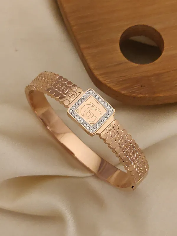 Rose_Gold_Gucci_Engraved_Bracelet_with_Embedded_Diamond