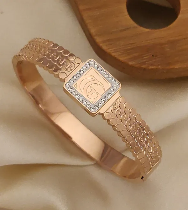 Rose_Gold_Gucci_Engraved_Bracelet_with_Embedded_Diamond