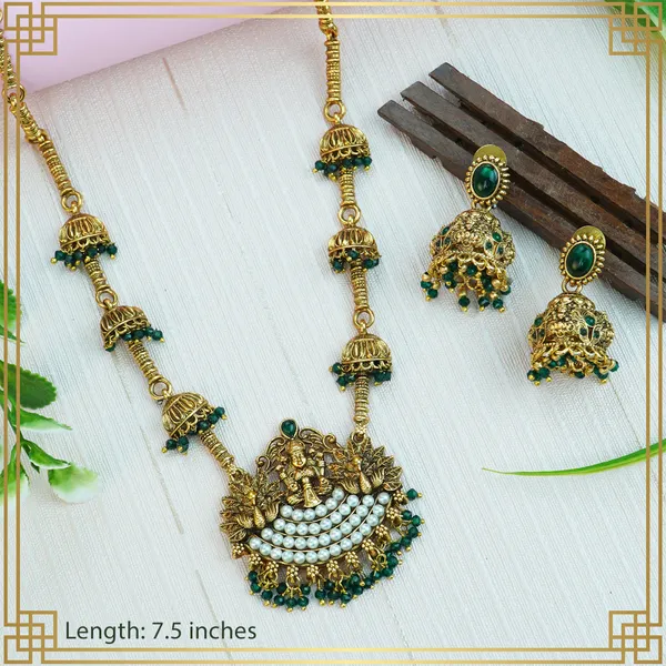 Green_Pendent_Set_For_The_Woman_Who_Loves_To_Shine_|_South_Indian_Jewellery
