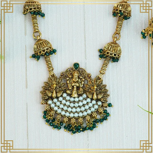 Green_Pendent_Set_For_The_Woman_Who_Loves_To_Shine_|_South_Indian_Jewellery