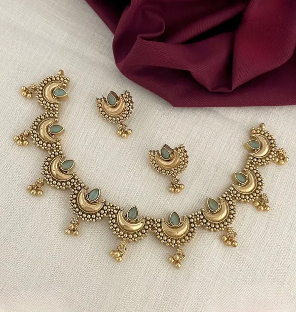 Alluring_Half_Moon_Designed_Light_Blue_Colour_Gemstone_Choker_Set_For_Women