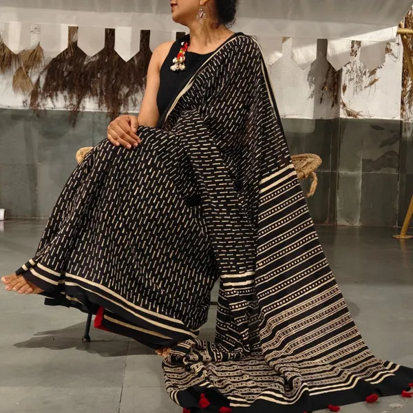 Noir_Cream_With_Scarlet_Tassels_Mulmul_Saree_With_Unstitched_Blouse_Piece